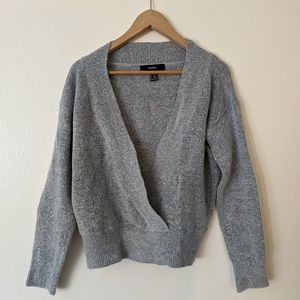 gray sweater with deep v line